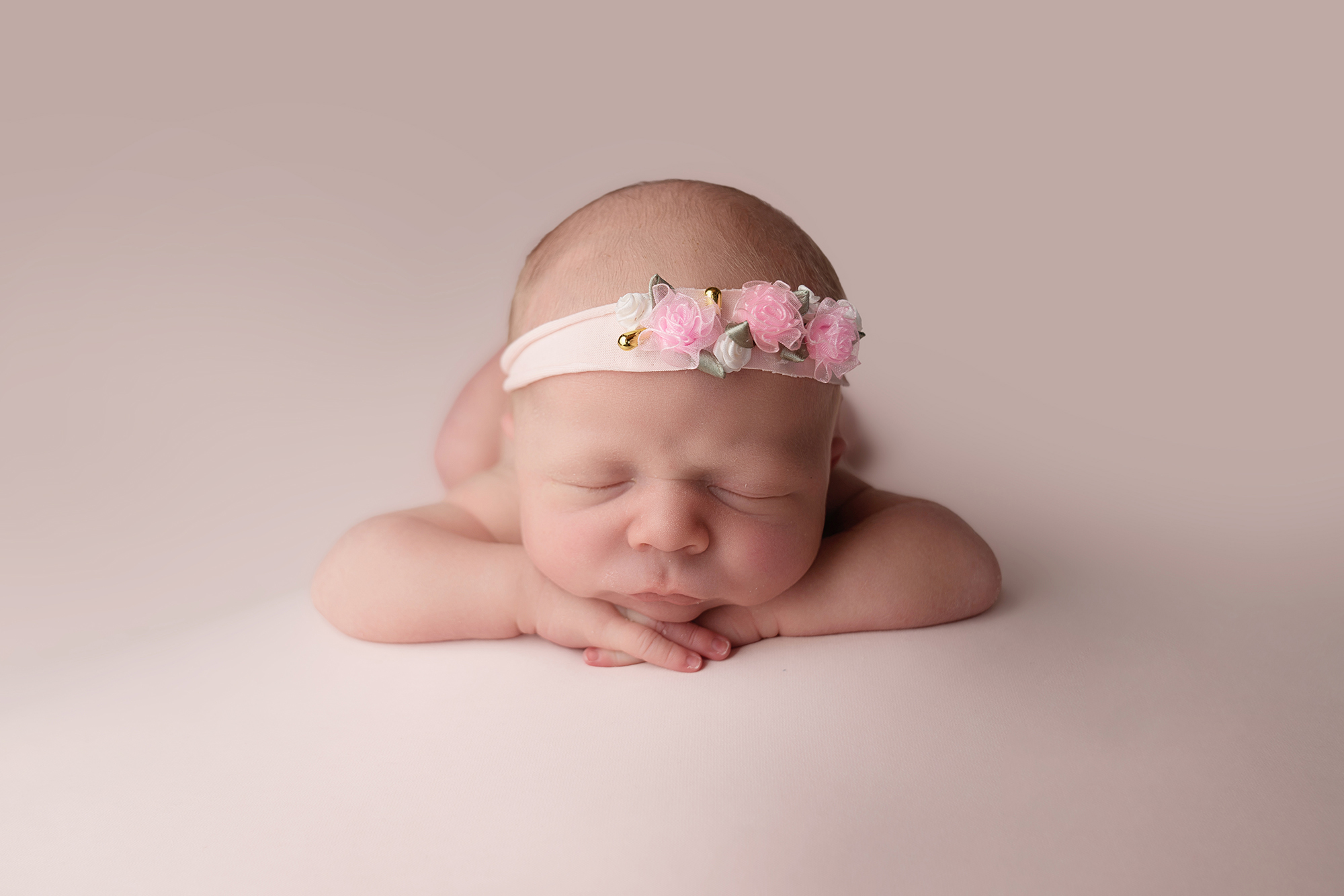 Newborn photography with flowers