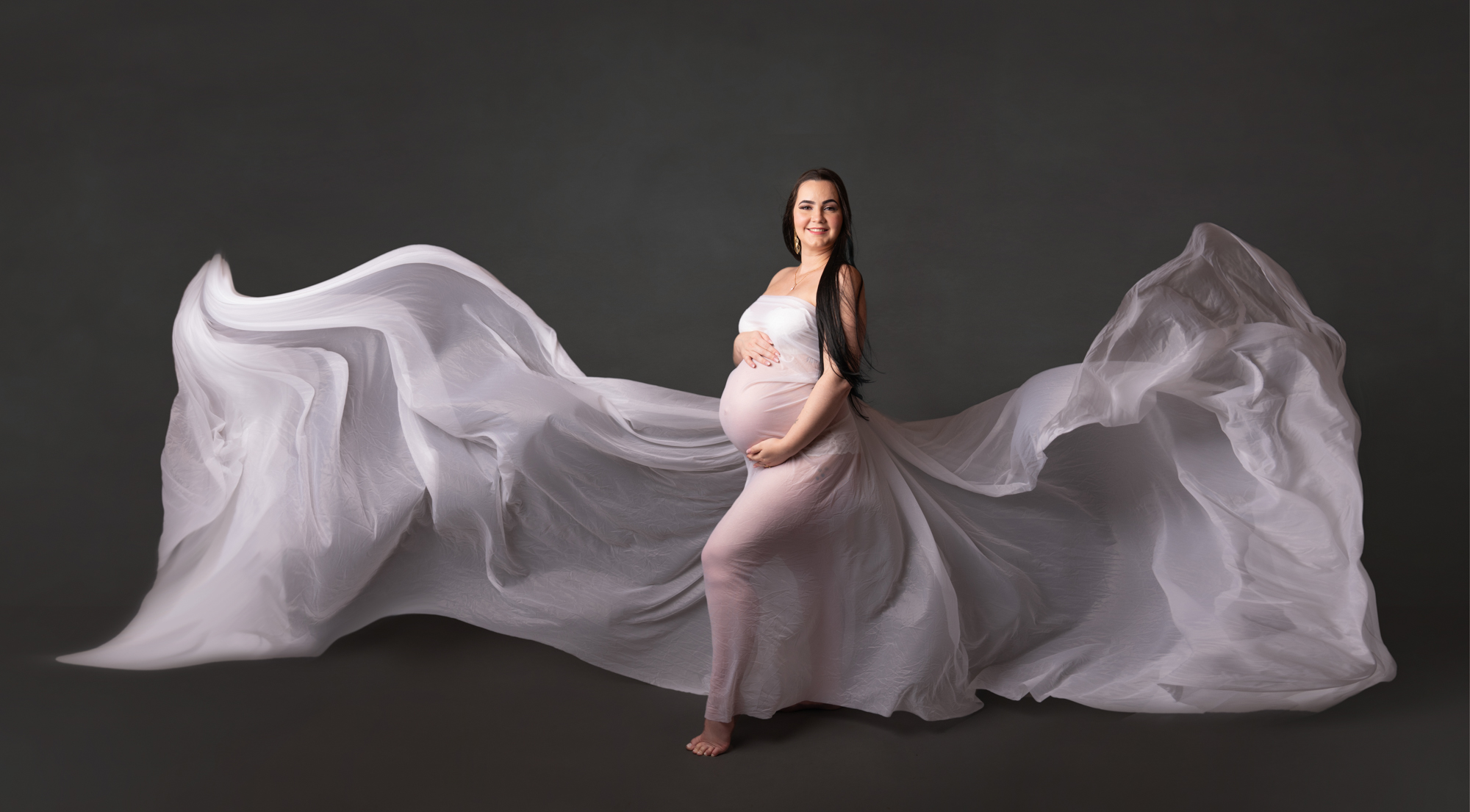 maternity shoot in white dress